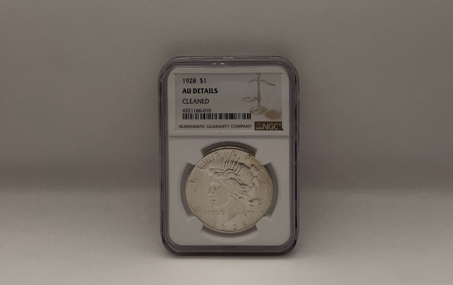 1928 $1 AU Details Cleaned