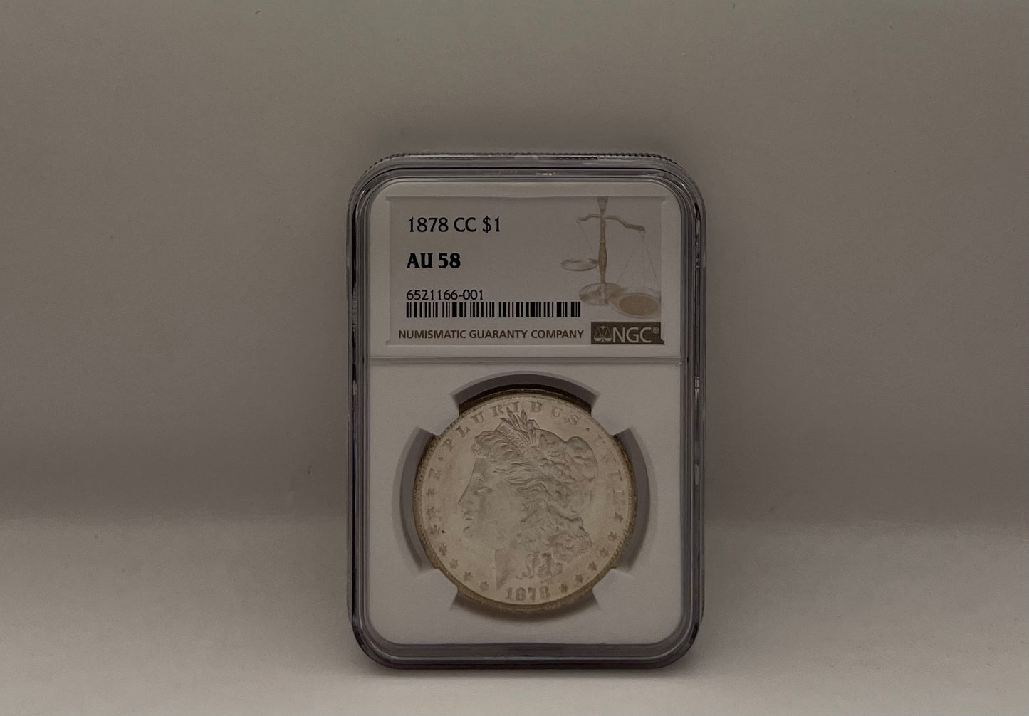 1878 CC $1 AU 58